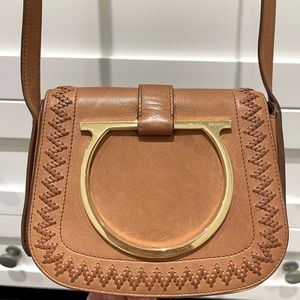 Salvatore Ferragamo tan leather cross body handbag.
